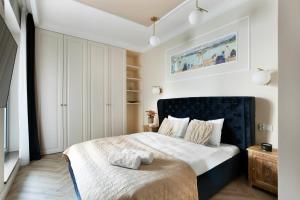 Posteľ alebo postele v izbe v ubytovaní Elite Apartments Granaria The View