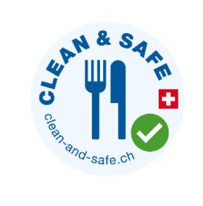 un logo per il club sicuro del ristorante Ham and Saat di Hapimag Resort Ascona ad Ascona