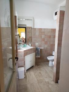 Vonios kambarys apgyvendinimo įstaigoje Casale di Befania
