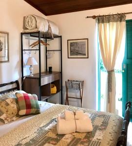 Postel nebo postele na pokoji v ubytování Pinheiros do Rocio