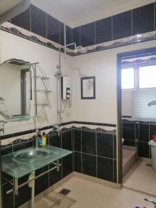 Ένα μπάνιο στο Homestay Banglo Alor Setar