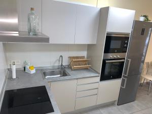 Kuchyň nebo kuchyňský kout v ubytování Cozy apartment Playa Las Vistas. Free Wifi. + 5 fotografií