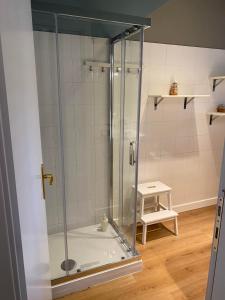 a shower with a glass door in a bathroom at Lucky's Home in Enna +7 photos