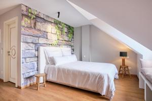 Voodi või voodid majutusasutuse The Kepos Hotel Erlangen toas