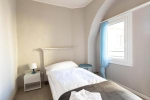 Letto o letti in una camera di Osteria Pozzo