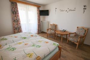 Postel nebo postele na pokoji v ubytování Hotel Charlott