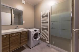 Koupelna v ubytování Ombeline + 5 fotografií