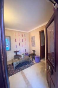 a hair salon with two hair stations in a room at Les Jardins Mandaline in Marrakech