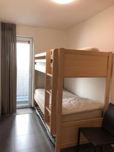 Postelja oz. postelje v sobi nastanitve Oostduinkerke Apartments
