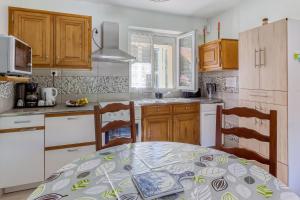 Η κουζίνα ή μικρή κουζίνα στο Le Bas Mont-Dore