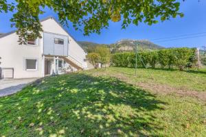 an image of a house with a yard at Le Bas Mont-Dore in La Bourboule