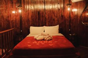 מיטה או מיטות בחדר ב-Pousada Botte di Vino