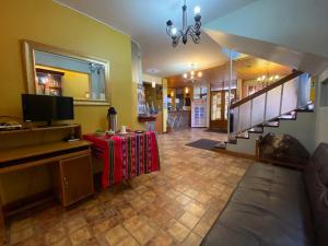 TV a/nebo společenská místnost v ubytování Hostal Oscar Inn