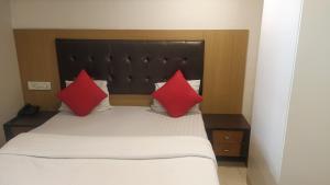 Postel nebo postele na pokoji v ubytování Hotel Palm Star