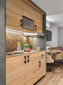 Kuchyň nebo kuchyňský kout v ubytování Hotel Seeblick
