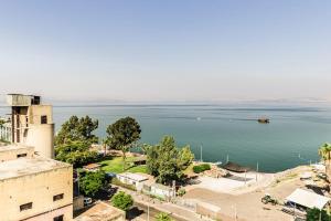 a view of a large body of water at נופש כנרת מגדלי המלכים in Tiberias