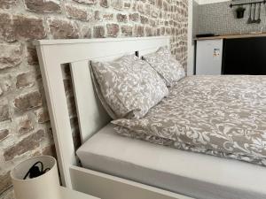 Postel nebo postele na pokoji v ubytování Apartman Sunny