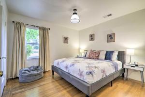 a bedroom with a bed and a window at Updated Menlo Park Home Less Than 1 Mile to Stanford! in Menlo Park
