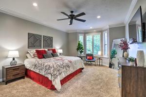 a bedroom with a bed and a ceiling fan at Cottonwood Heights House with Deck and Gas Grill! in Cottonwood Heights