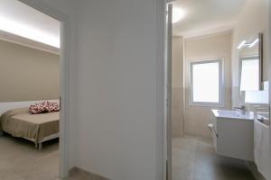 Ένα ή περισσότερα κρεβάτια σε δωμάτιο στο Sulla Rotta dei Mille +10 φωτογραφίες