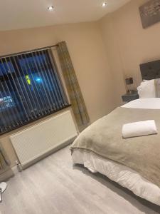 Voodi või voodid majutusasutuse Modern & Convenient toas