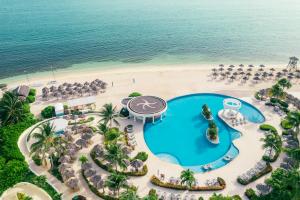 an overhead view of the beach and pool at the resort at Iberostar Selection Rose Hall Suites in Montego Bay
