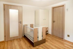 Letto o letti in una camera di Apartmán u Jiříka