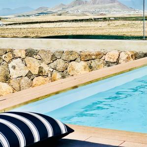 Bazén v ubytovaní Canaryislandshost l The Sky Suites alebo v jeho blízkosti
