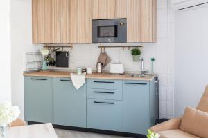 Kuchnia lub aneks kuchenny w obiekcie Madrid Comfort Suites