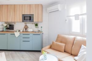 Kuchnia lub aneks kuchenny w obiekcie Madrid Comfort Suites