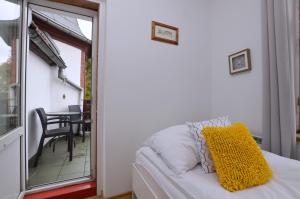 Łóżko lub łóżka w pokoju w obiekcie Piękny Apartament 3city z Balkonem w Centrum Sopotu by Noclegi Renters