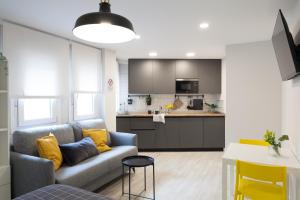 Kuchyň nebo kuchyňský kout v ubytování Madrid Comfort Suites + 37 fotografií