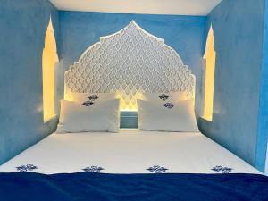 Letto o letti in una camera di Maison Chafia Boutique Hôtel & Spa