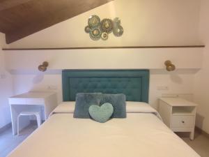 Postel nebo postele na pokoji v ubytování PEÑAFIEL DREAMS con JACUZZI