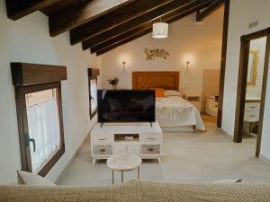 Postel nebo postele na pokoji v ubytování PEÑAFIEL DREAMS con JACUZZI