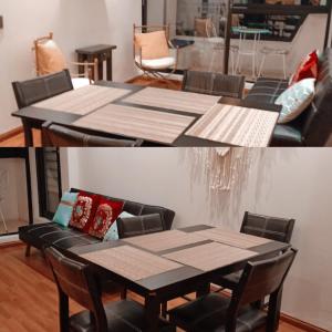 einen Tisch und Stühle in einem Zimmer in der Unterkunft Departamento frente al mar 3 habitaciones 2 baños in Coquimbo + 2 Fotos