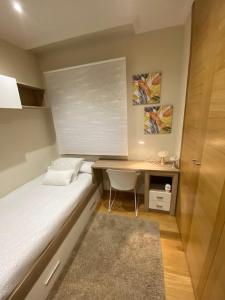 Posteľ alebo postele v izbe v ubytovaní Apartamento Centro Ciudad Pontevedra