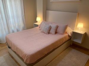 Posteľ alebo postele v izbe v ubytovaní Apartamento Centro Ciudad Pontevedra