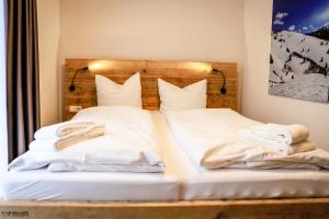Postel nebo postele na pokoji v ubytování Smart Resorts Haus Azur Ferienwohnung 806