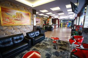 Area soggiorno di Batam City Hotel