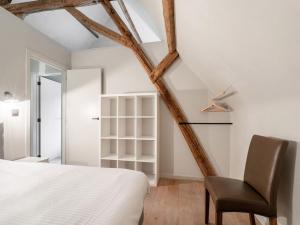 Voodi või voodid majutusasutuse Holiday Home near Bruges with Sauna toas