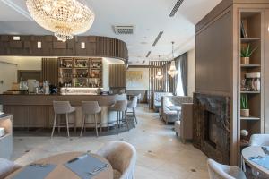 Uma área de estar em CALVARY Hotel & Restaurant Vilnius