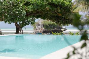 Bazén v ubytování Upendo Beach Boutique Hotel Zanzibar nebo v jeho okolí