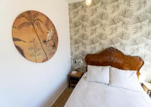 A bed or beds in a room at RentalSevilla Concejal Alberto Jiménez-Becerril
