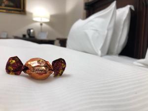 Postel nebo postele na pokoji v ubytování Picasso Boutique Hotel