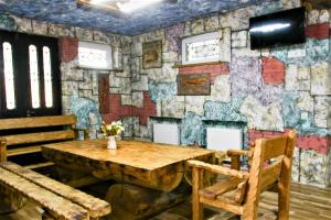 TV a/nebo společenská místnost v ubytování Mango's Guesthouse