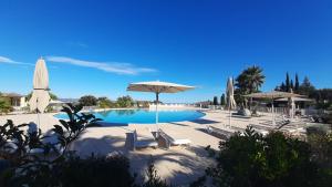 Appartement domaine du Golf de Roquebrune Resort - Résidence Le Saint Andrews 내부 또는 인근 수영장