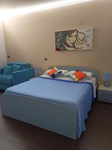 Katil atau katil-katil dalam bilik di La Luna e il Sole