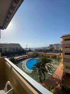 a view of a swimming pool from a building at Pier View Los Cristianos Free WiFi in Los Cristianos