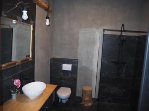 Kúpeľňa v ubytovaní Apartament Kołobrzeska
